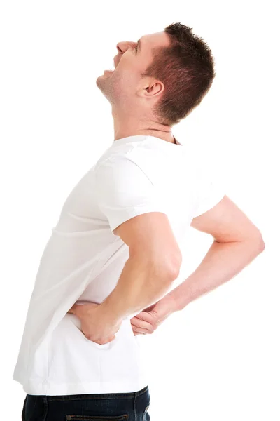 Hombre en agonía con dolor de espalda — Foto de Stock