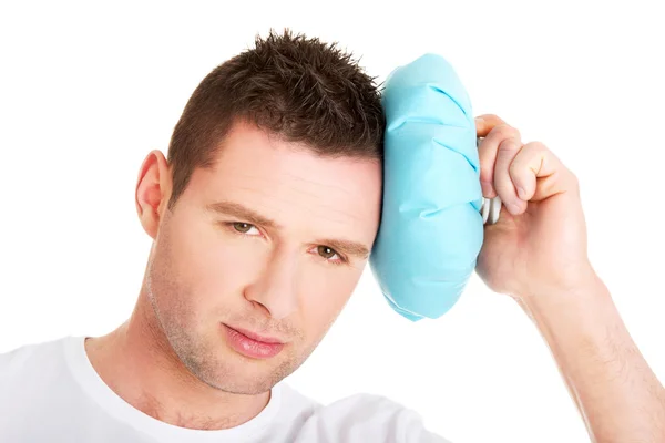 Man with ice bag for headaches — Stock Photo, Image