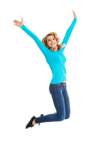 Young casual woman, student jumping. — Stock Photo, Image