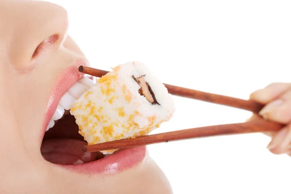 Woman eating sushi — Stock Photo, Image