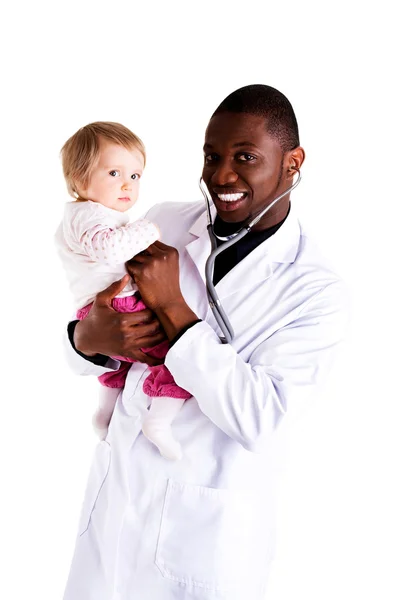Smiling doctor with small baby Stock Image
