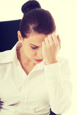 Genç iş kadını yorgun.