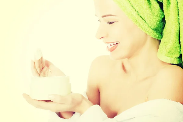 Beautiful woman with towel in bathrobe. — Stock Photo, Image