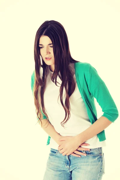 Young woman is having stomach ache. — Stock Photo, Image