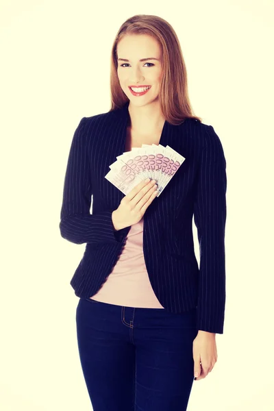 Mulher de negócios segurando euro moeda dinheiro . — Fotografia de Stock