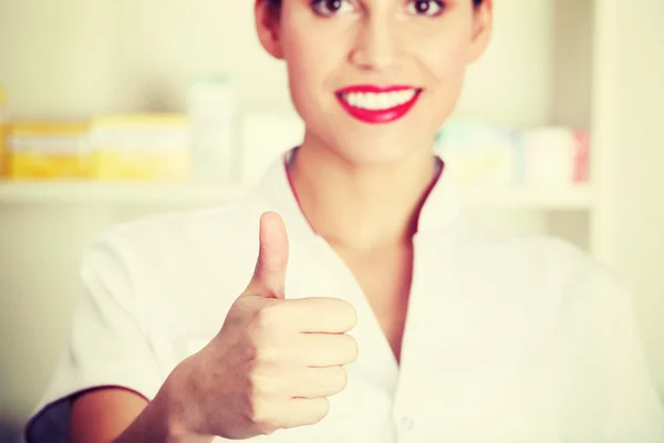 Young nurse, doctor showing ok gesture. — Stock Photo, Image