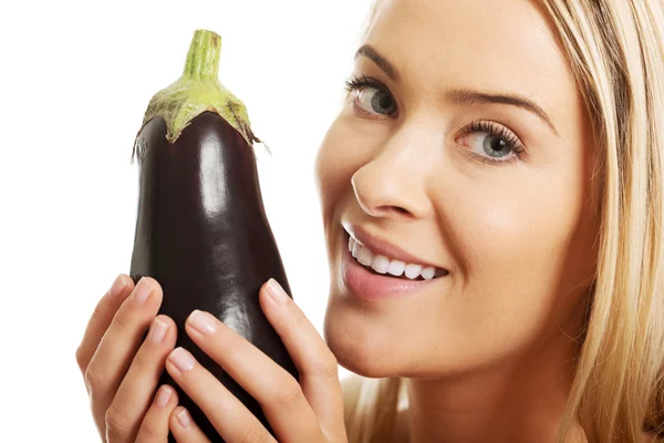 Woman holding eggplant — Stock Photo, Image