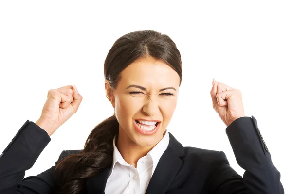 Angry businesswoman making fists up — Stock Photo, Image