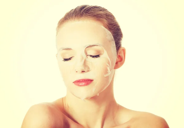 Beautiful woman with collagen mask on face. — Stock Photo, Image