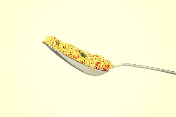 Close up on a spoon with spices. — Stock Photo, Image