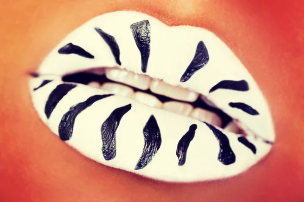 White lipstick on mouth with black stripes. — Stock Photo, Image