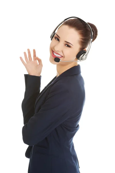 Mujer del centro de llamadas con auriculares . —  Fotos de Stock