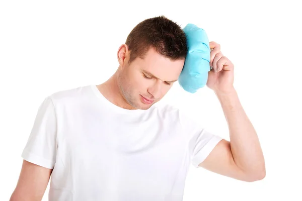 Man with ice bag for headaches — Stock Photo, Image