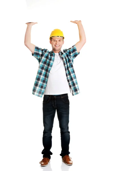 Happy worker presenting empty banner. — Stock Photo, Image