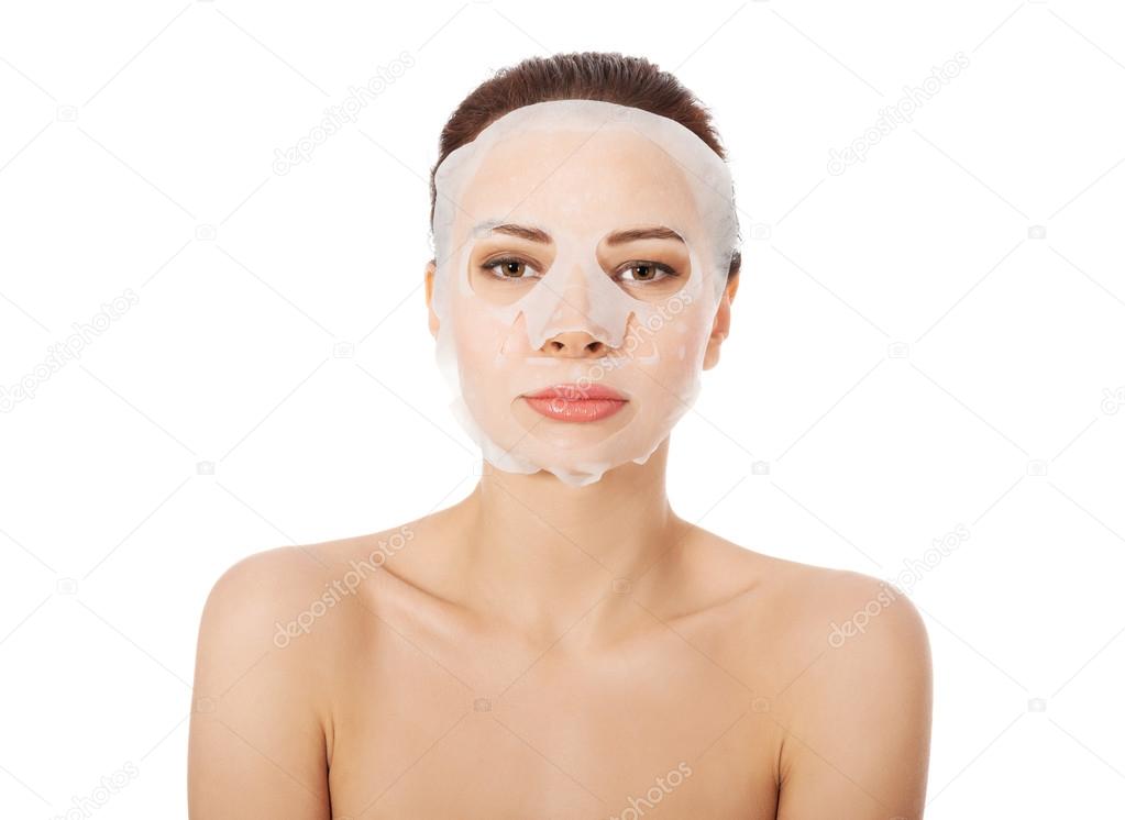 Beautiful woman with collagen mask.