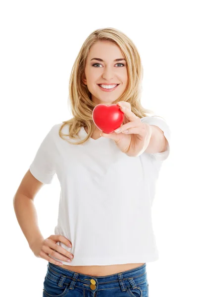 Smiling woman with red heart — Stock Photo, Image