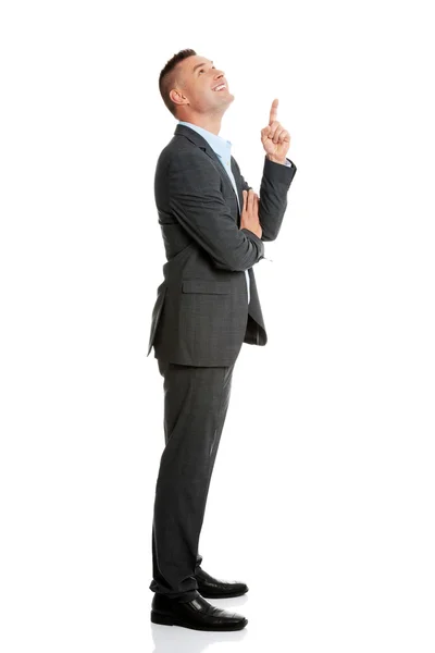 Businessmanshowing copy space — Stock Photo, Image