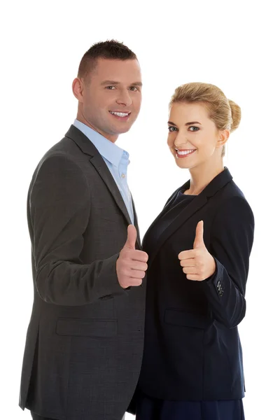 Business couple showing thumbs up — Stock Photo, Image