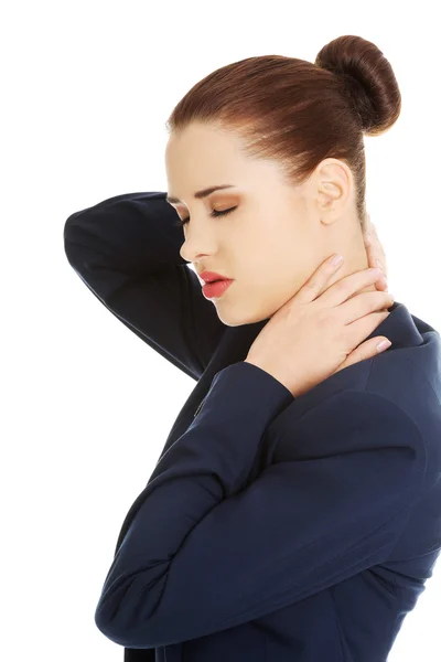 Geschäftsfrau mit Rückenschmerzen — Stockfoto