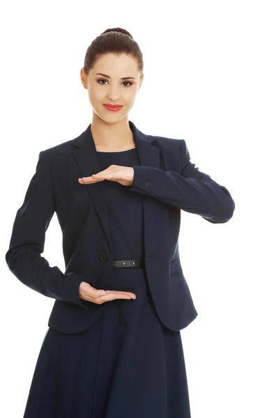 Business woman showing something or copyspase — Stock Photo, Image