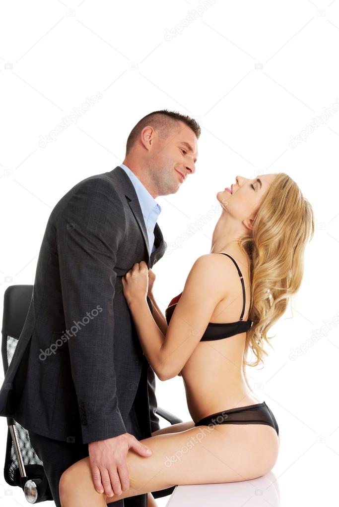 Seductive woman and man - office romance concept