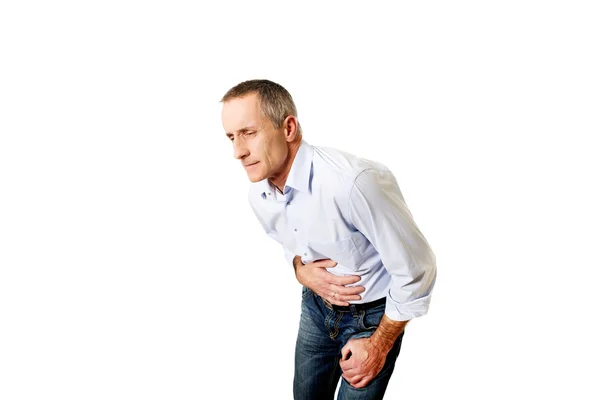 Mature man suffering from stomachache — Stock Photo, Image