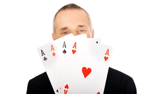 Elegant man with four aces — Stock Photo, Image