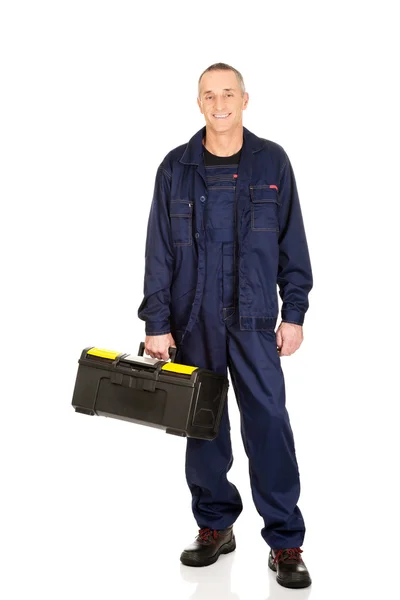 Mature worker with tools bag — Stock Photo, Image