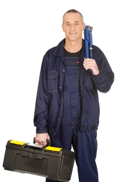 Mature worker with tools bag — Stock Photo, Image