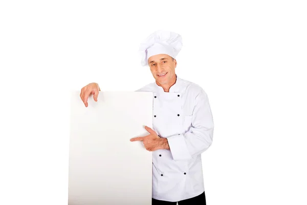 Chef holding empty banner — Stock Photo, Image