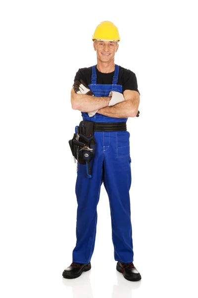 Mature worker with folded arms — Stock Photo, Image