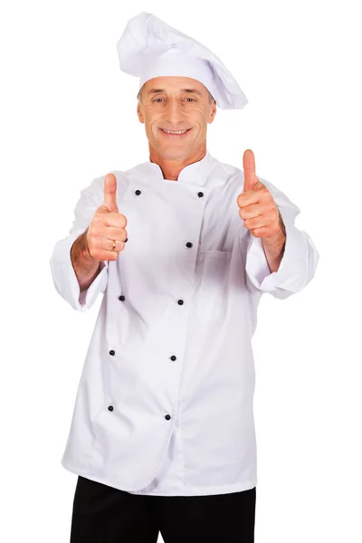 Chef en sombrero blanco con pulgares hacia arriba signo — Foto de Stock