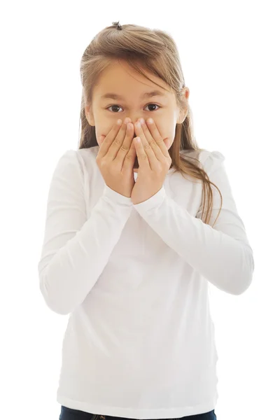 Girl covered her mouth with her hands — Stock Photo, Image