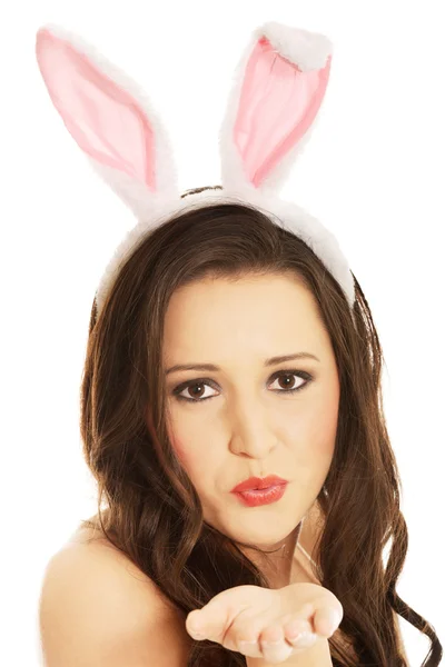 Woman wearing bunny ears — Stock Photo, Image