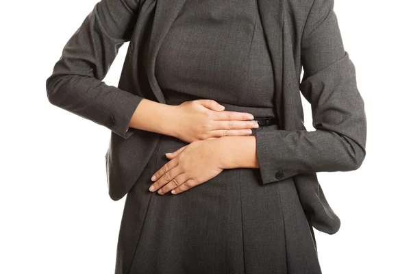 Businesswoman with strong stomachache — Stock Photo, Image
