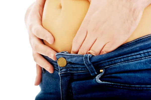 Male hand in woman's jeans. — Stock Photo, Image