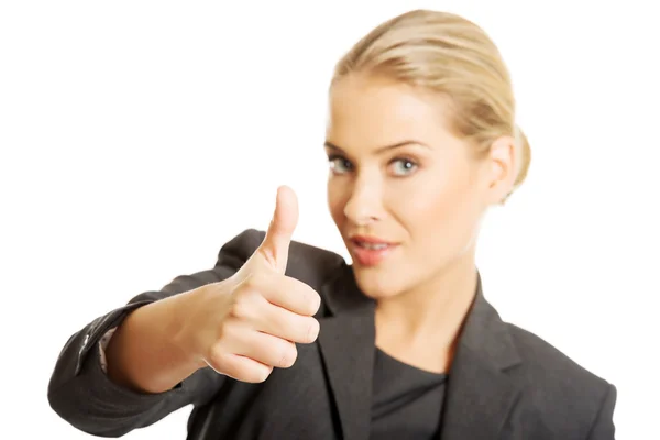 Businesswoman with thumb up gesture Royalty Free Stock Images