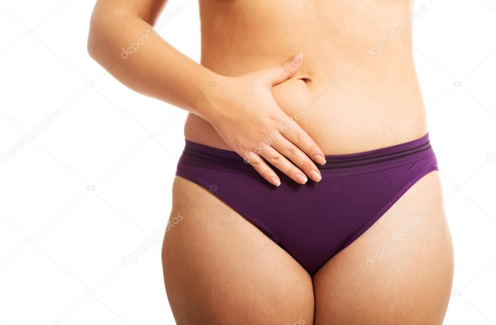 Womans fat belly in underwear Stock Photo by ©piotr_marcinski 63261609