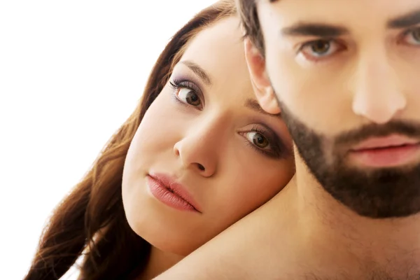 Woman with her head on man's back. — Stock Photo, Image