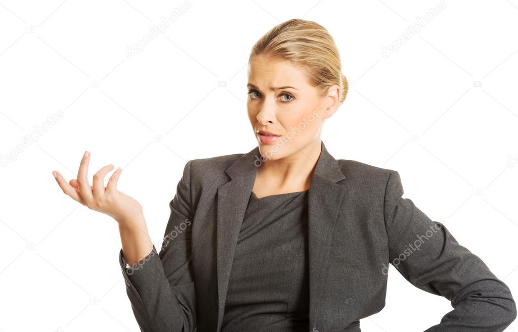 Confused woman showing irritate gesture