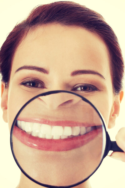 Woman with magnifying glass