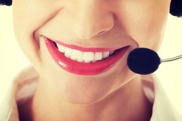 Sonrisa de una mujer en el centro de llamadas . —  Fotos de Stock
