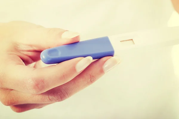 Pregnancy test in female hand — Stock Photo, Image