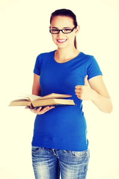 Jovem estudante com livro . — Fotografia de Stock