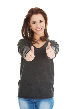 ok el işareti ile mutlu bir kadın