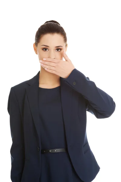 Businesswoman covering her mouth — Stock Photo, Image