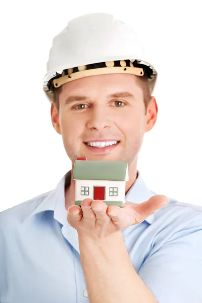 A foreman holding a model house — Stock Photo, Image