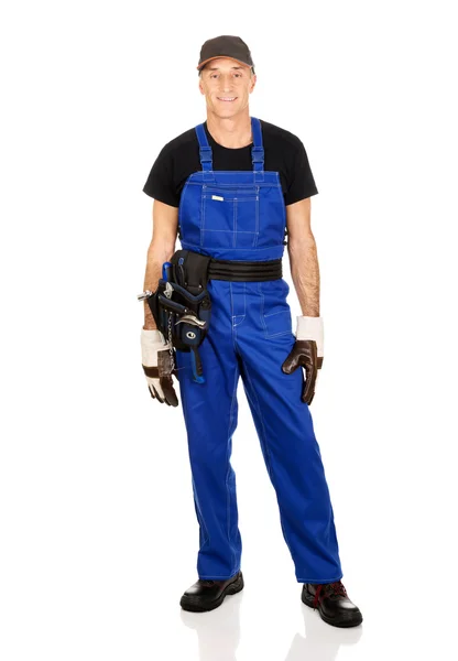 Mature worker with tool belt — Stock Photo, Image