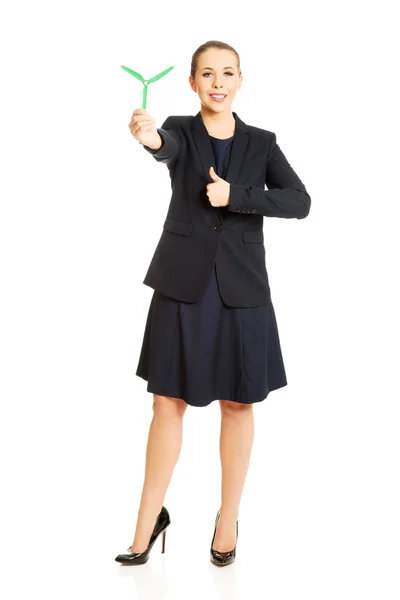 Businesswoman with windmill. — Stock Photo, Image