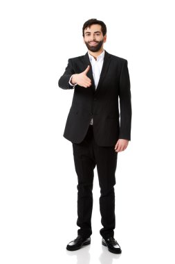 Businessman offering a handshake.